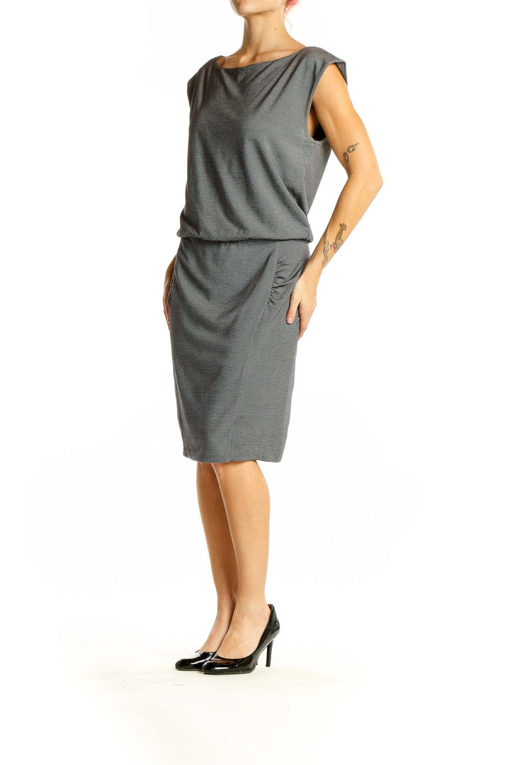 Front view of gray sleeveless blouson dress from Athleta