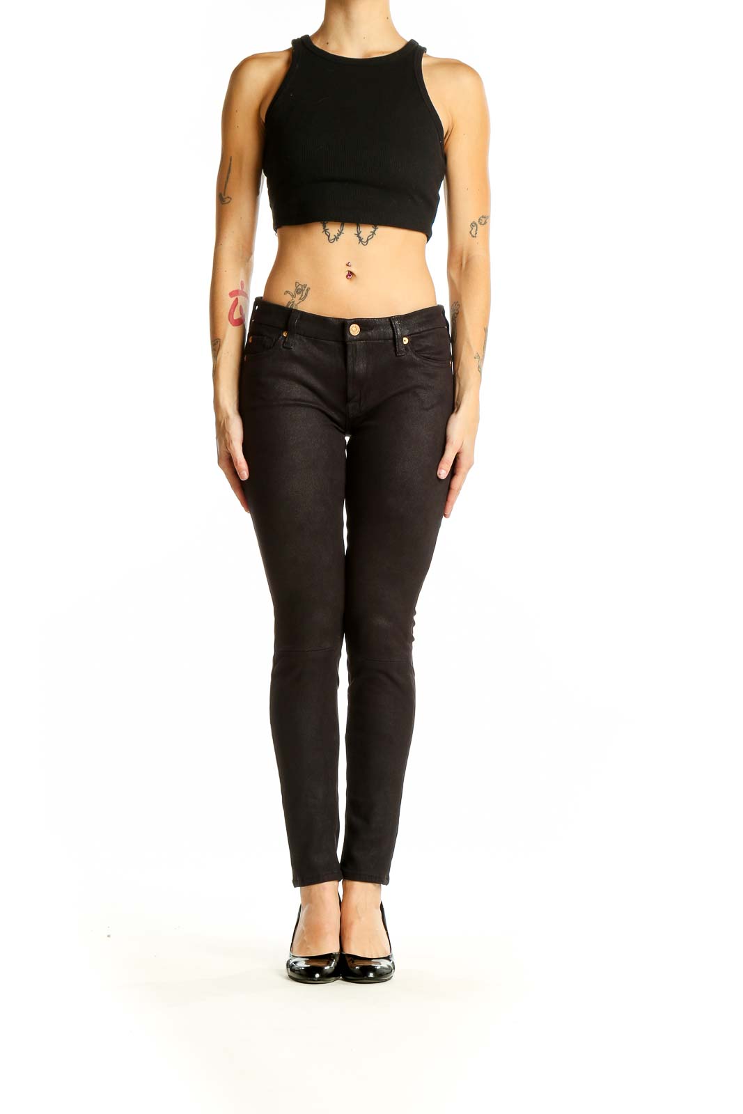 Front view of 7 For All Mankind black skinny pants on model