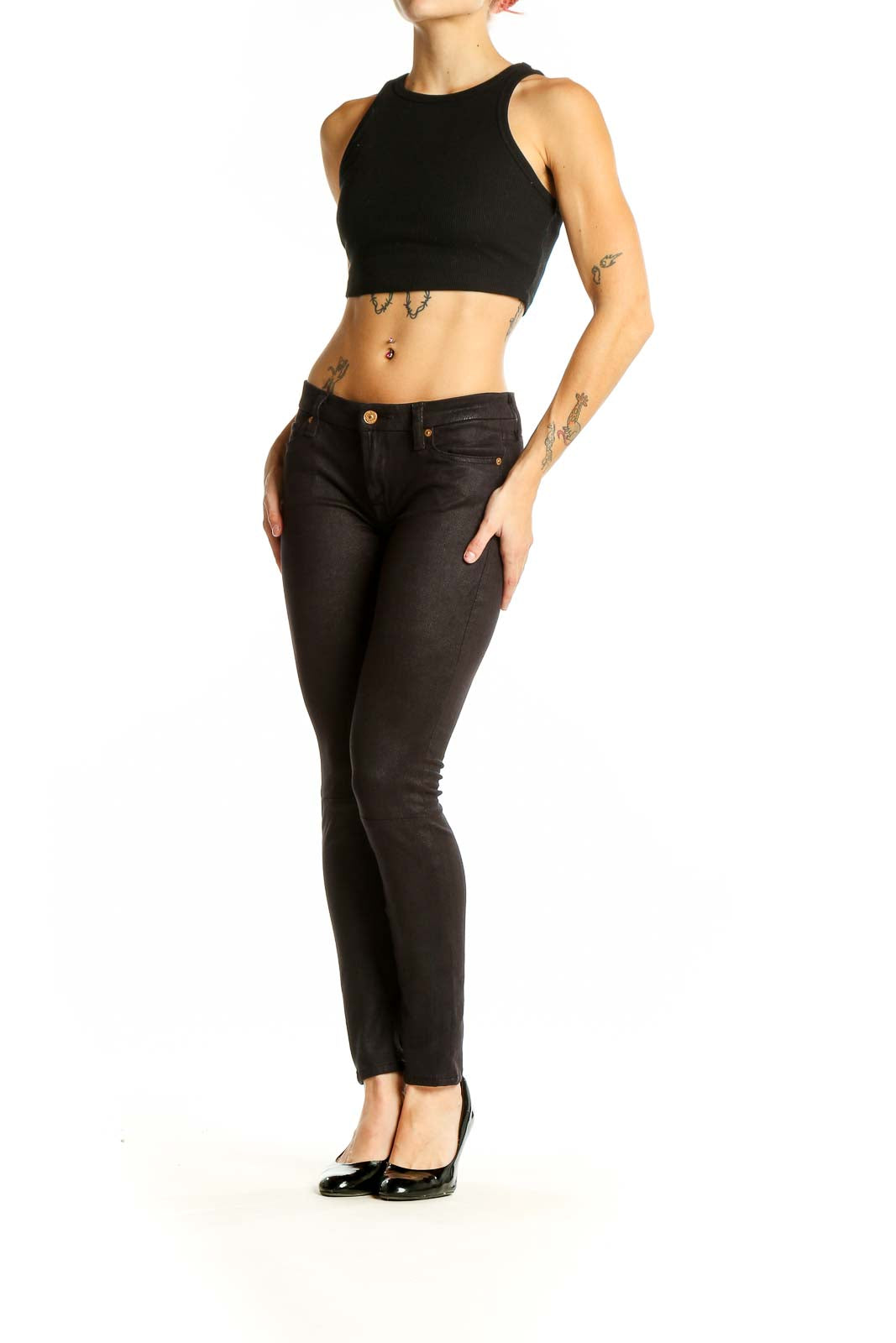 Front view of 7 For All Mankind black skinny pants on model