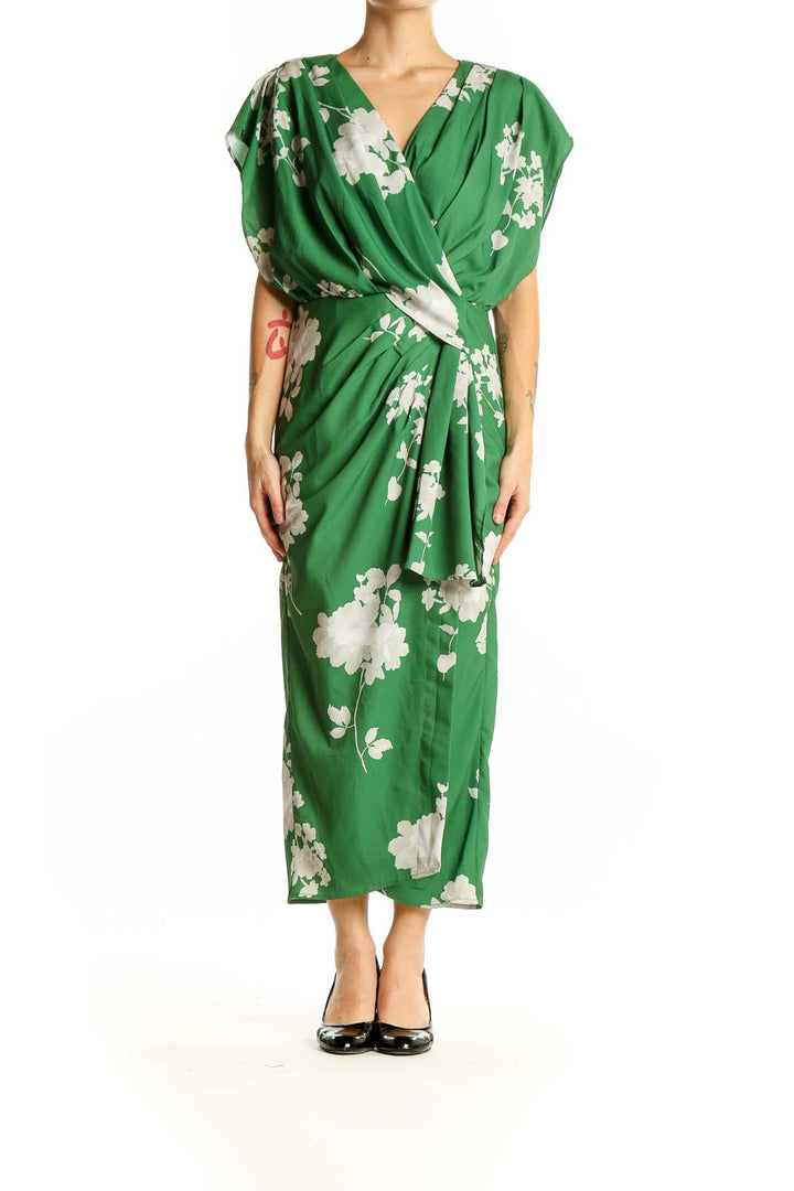 Front view of green floral wrap midi dress by Wayward Fancies