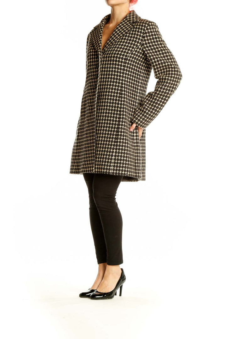 Front view of Ann Taylor black and tan polka dot coat