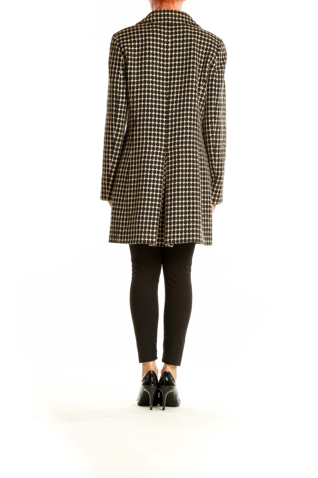 Side view of Ann Taylor black and tan polka dot coat on model