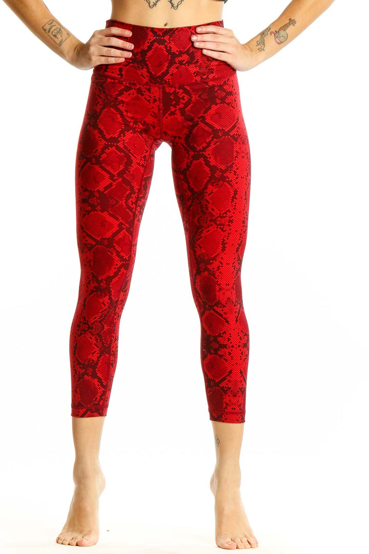 Front view of red snake print capri leggings from Lululemon