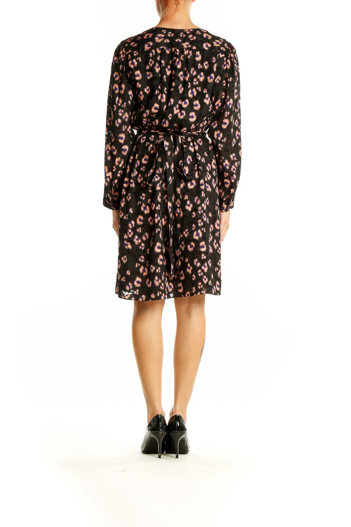 Side view of Rebecca Taylor black floral print wrap dress showing silhouette