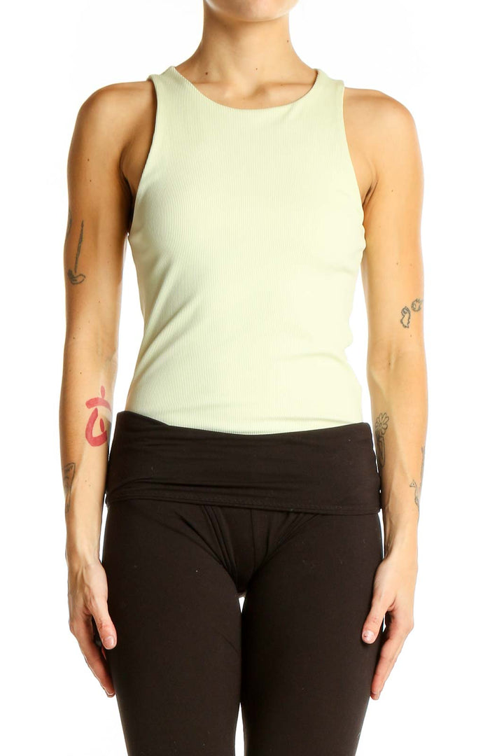 Front view of pale yellow ribbed sleeveless tank top from Express