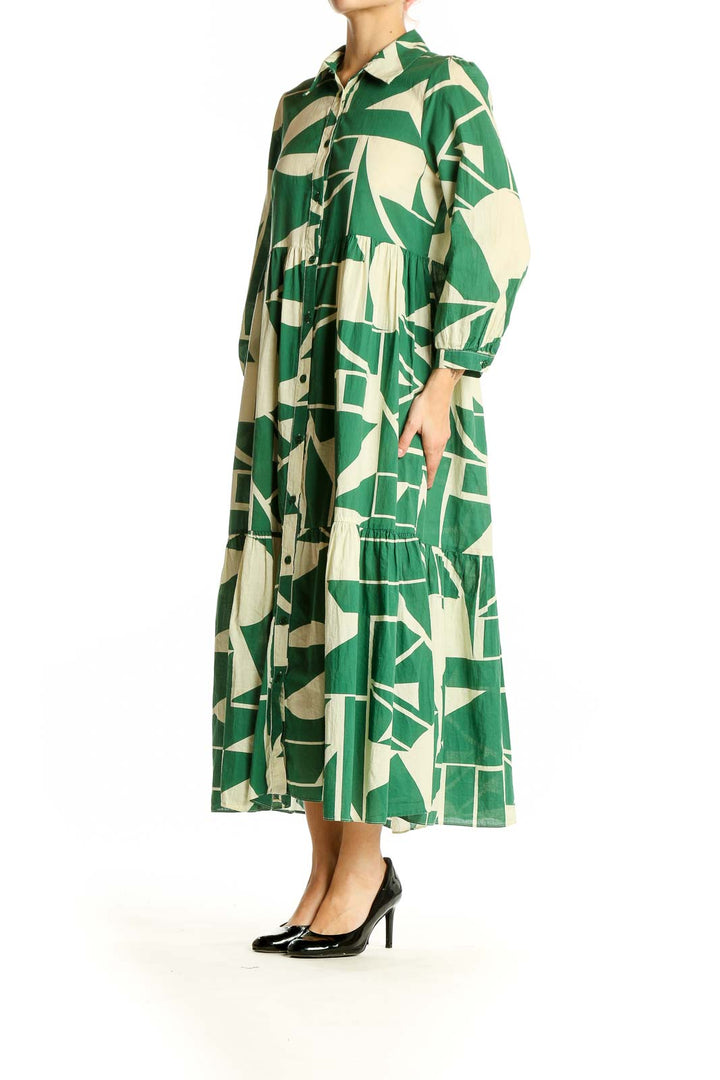 Front view of Zara green geometric print maxi shirt dress with tiered design