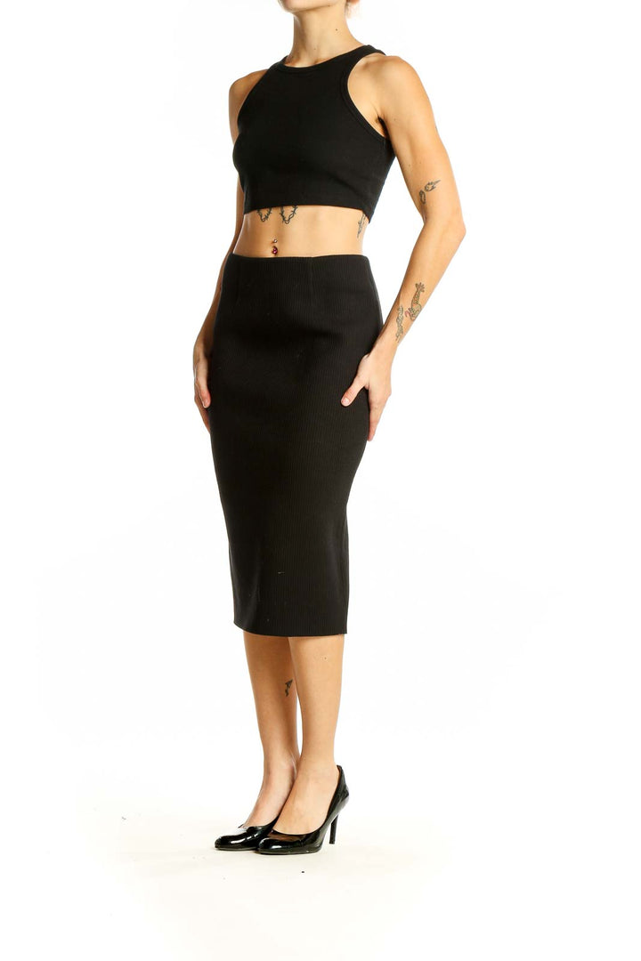 Front view of Six Crisp Days black ribbed midi pencil skirt