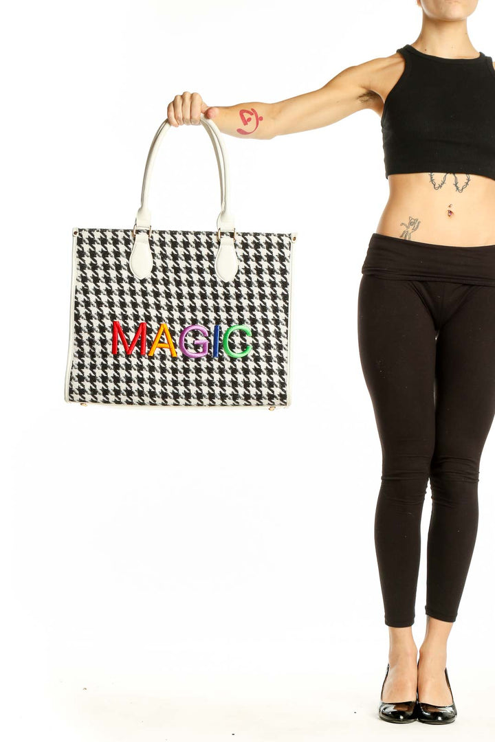 Front view of Magic Hill houndstooth tote bag with rainbow logo