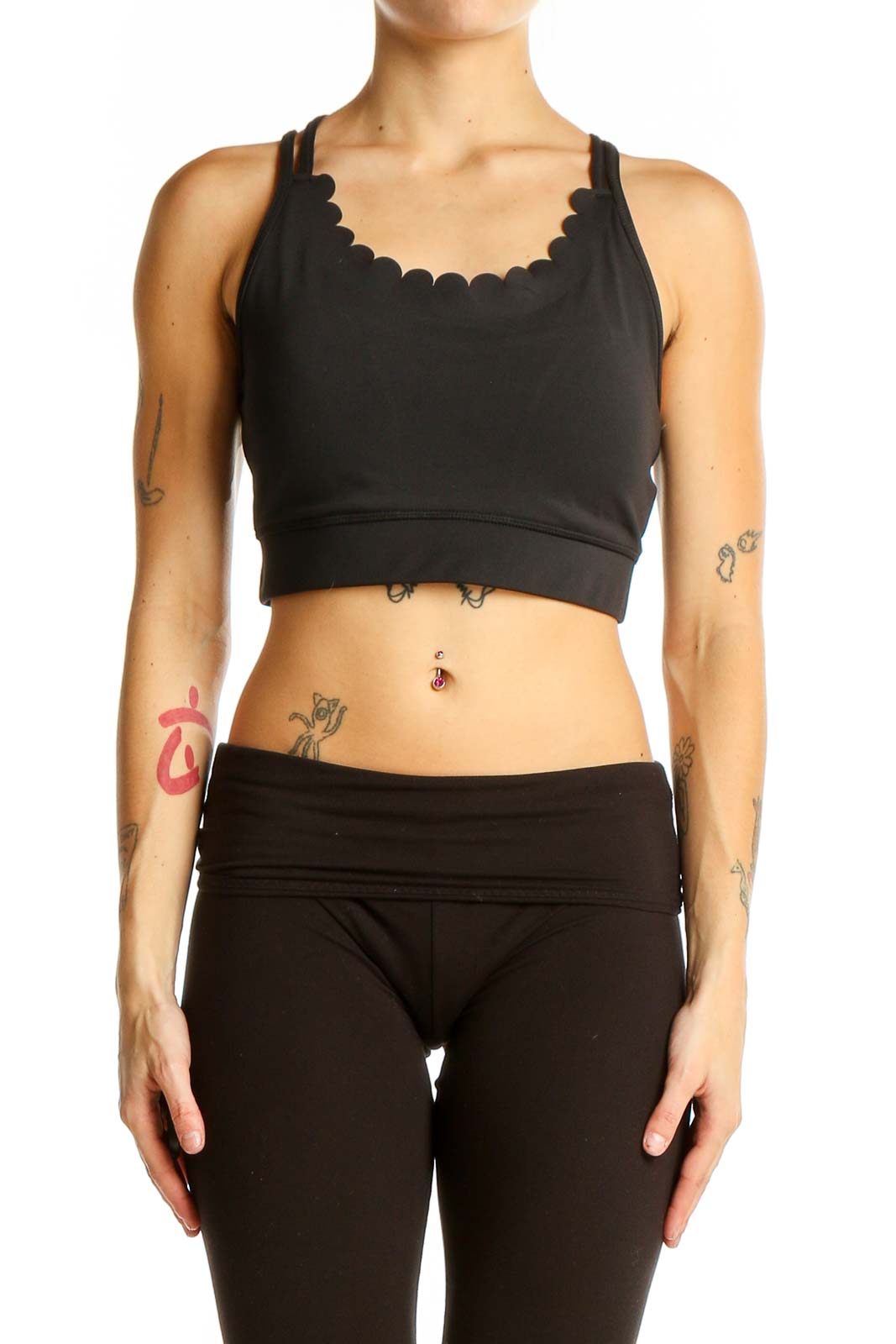 Front view of black Kate Spade crop top with scalloped neckline