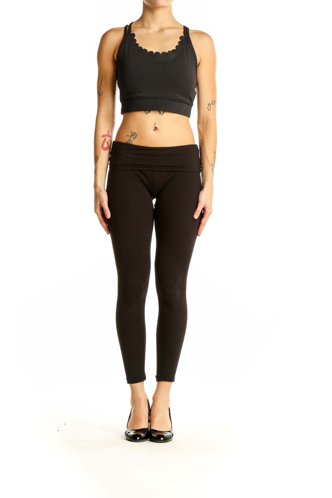 Front view of black Kate Spade crop top with scalloped neckline