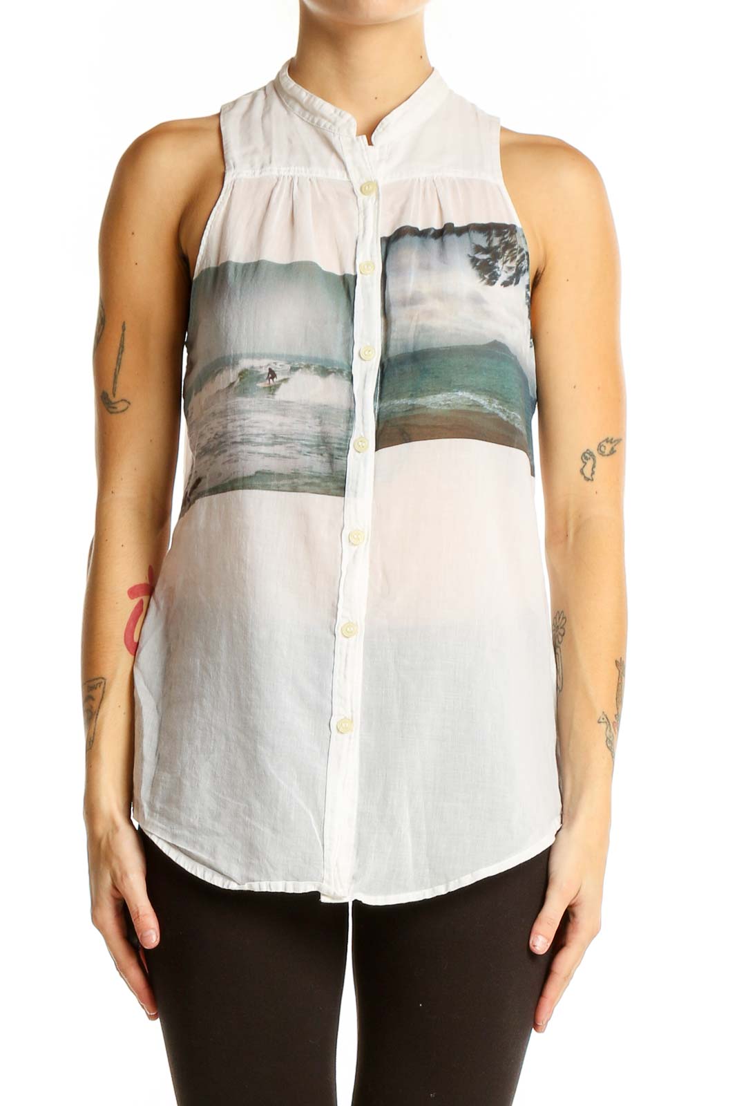 Front view of HD in Paris white sleeveless blouse with beach scene print