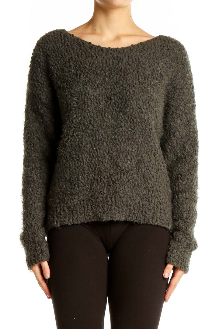 Front view of olive textured knit sweater from Sage, showcasing oversized fit and boat neckline