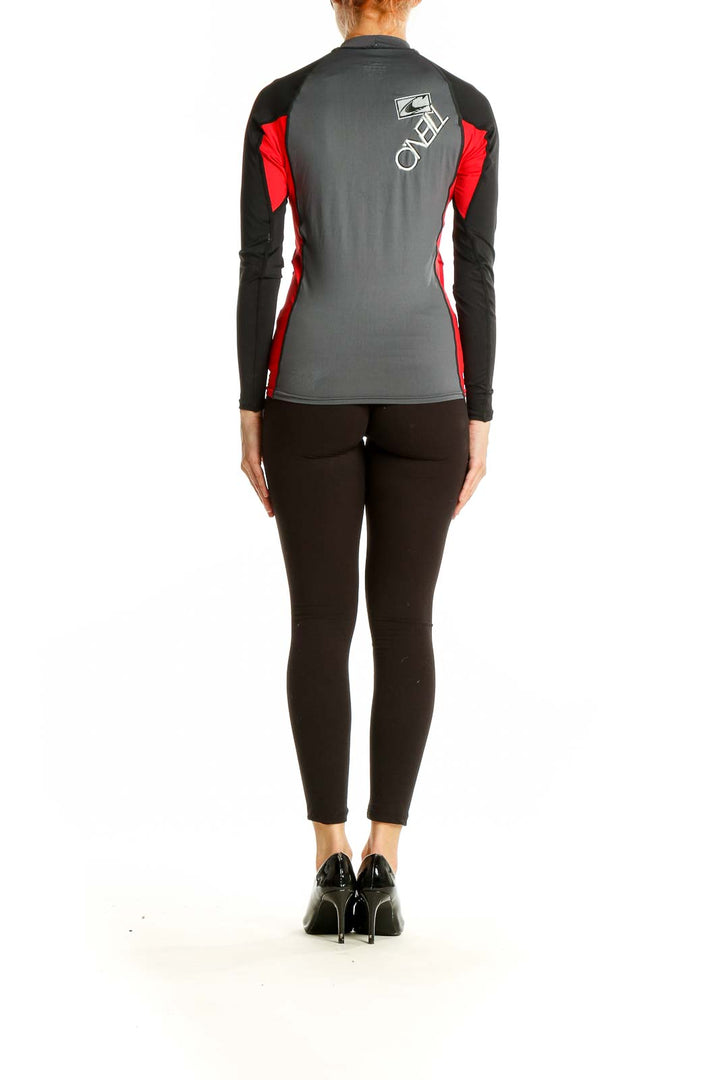 Back view of O'Neill rash guard showing gray body and black sleeves