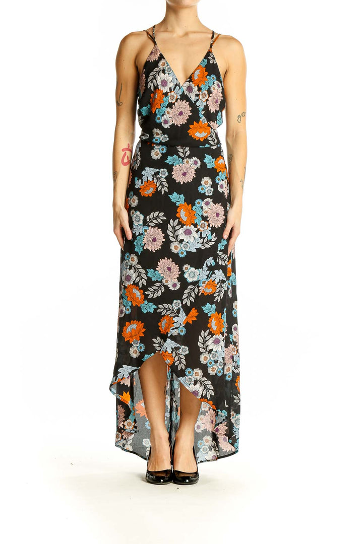 Front view of ASTR black floral maxi dress with wrap-style bodice