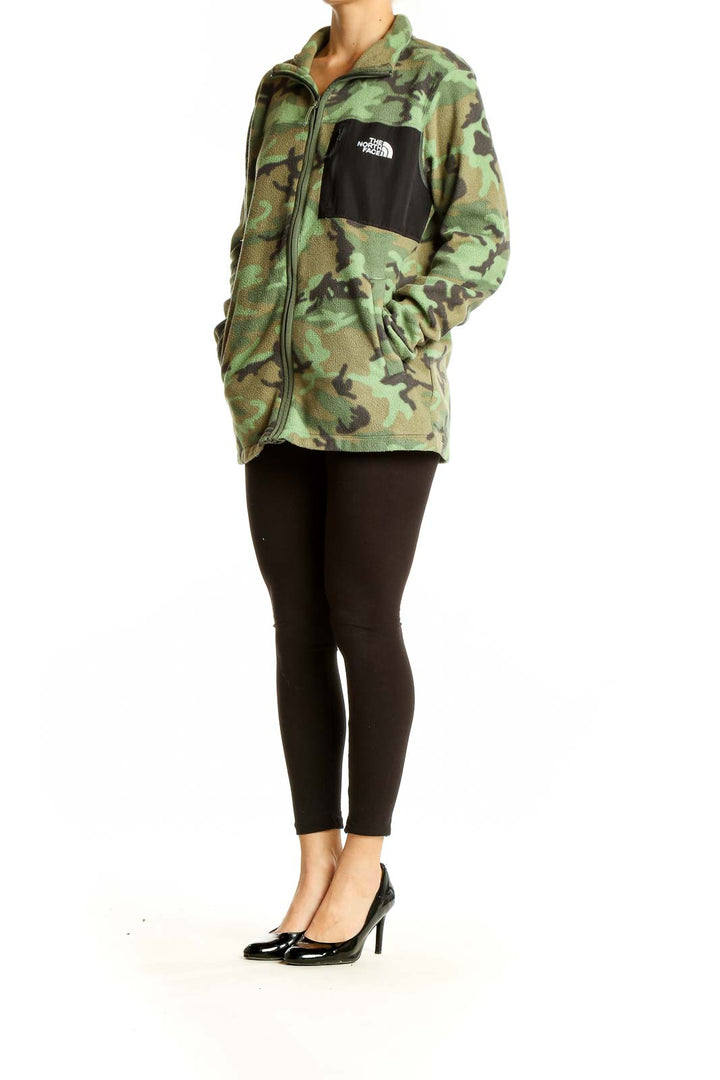 Front view of The North Face green camouflage fleece jacket with black chest pocket