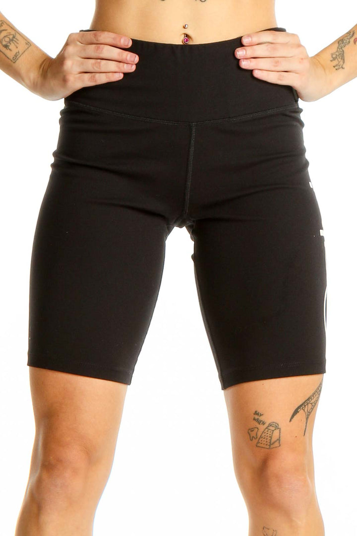 Front view of black high-waisted bike shorts by Calvin Klein Performance