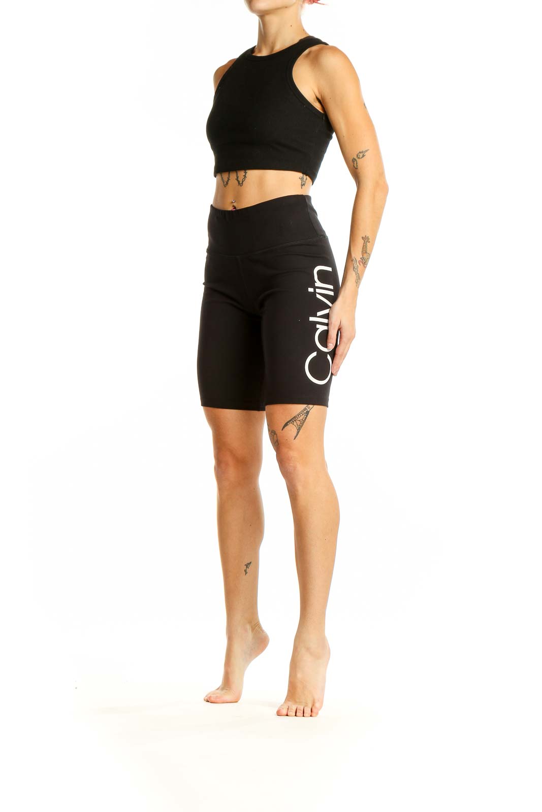 Front view of black high-waisted bike shorts by Calvin Klein Performance