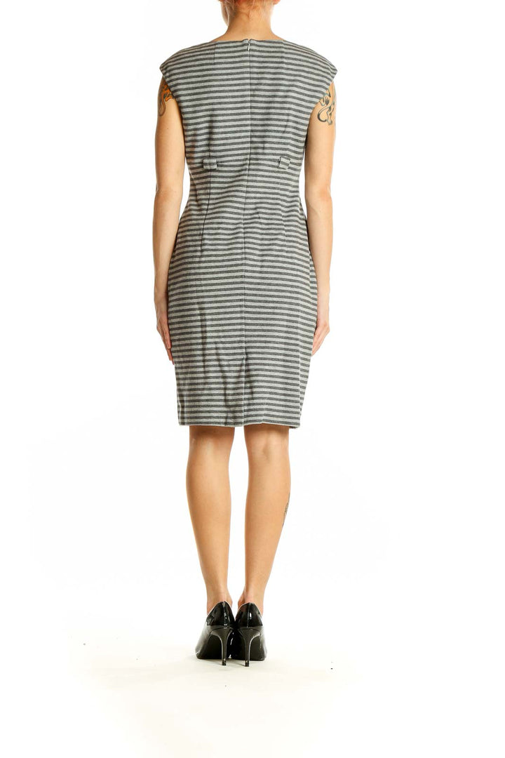 Back view of gray striped Calvin Klein sheath dress showing fitted silhouette