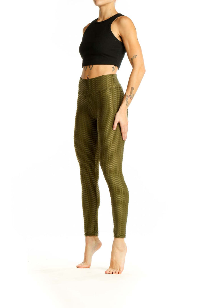 Front view of olive textured high-waist activewear leggings by SilkRoll