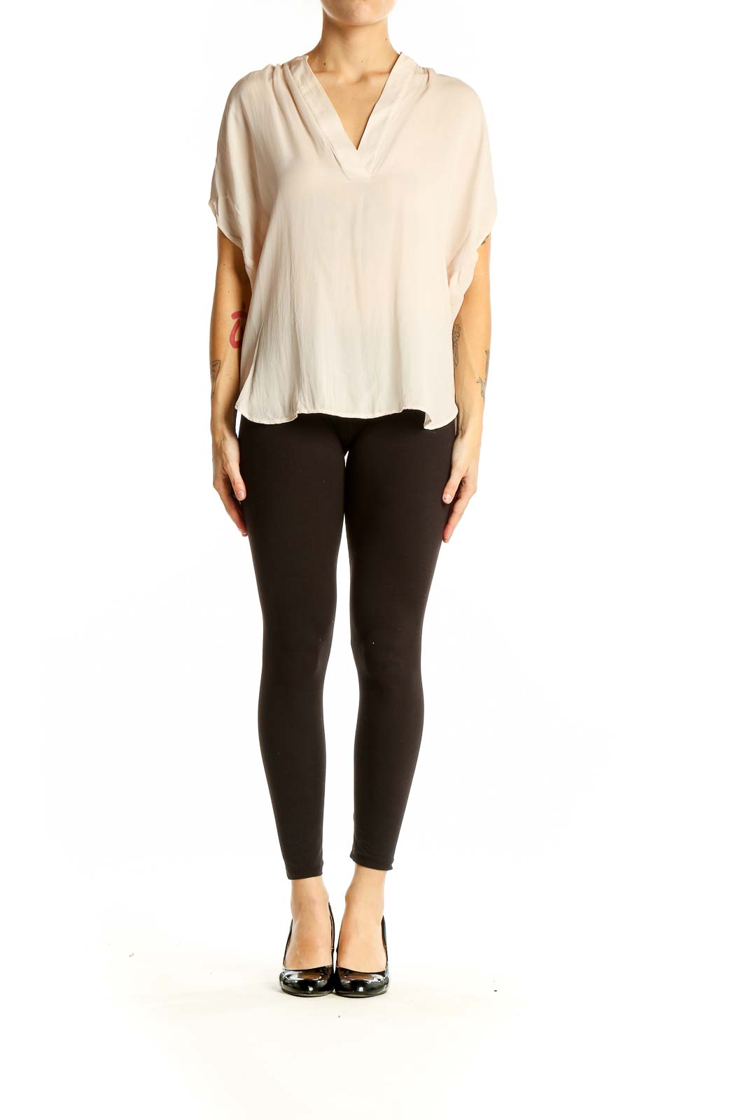 Front view of cream silk V-neck blouse by Vince