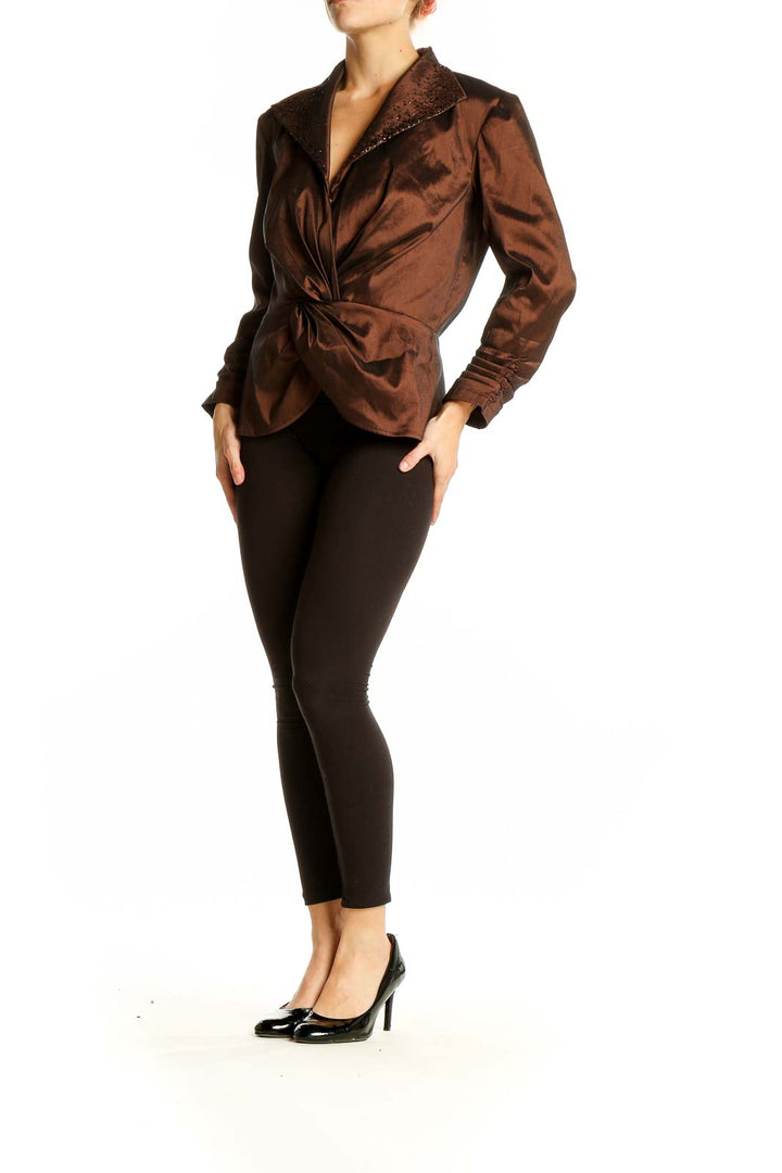 Front view of brown Tadashi twist-front blouse with shimmering collar