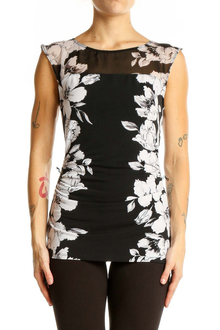 Front view of Black and White Floral Sleeveless Top from White House Black Market