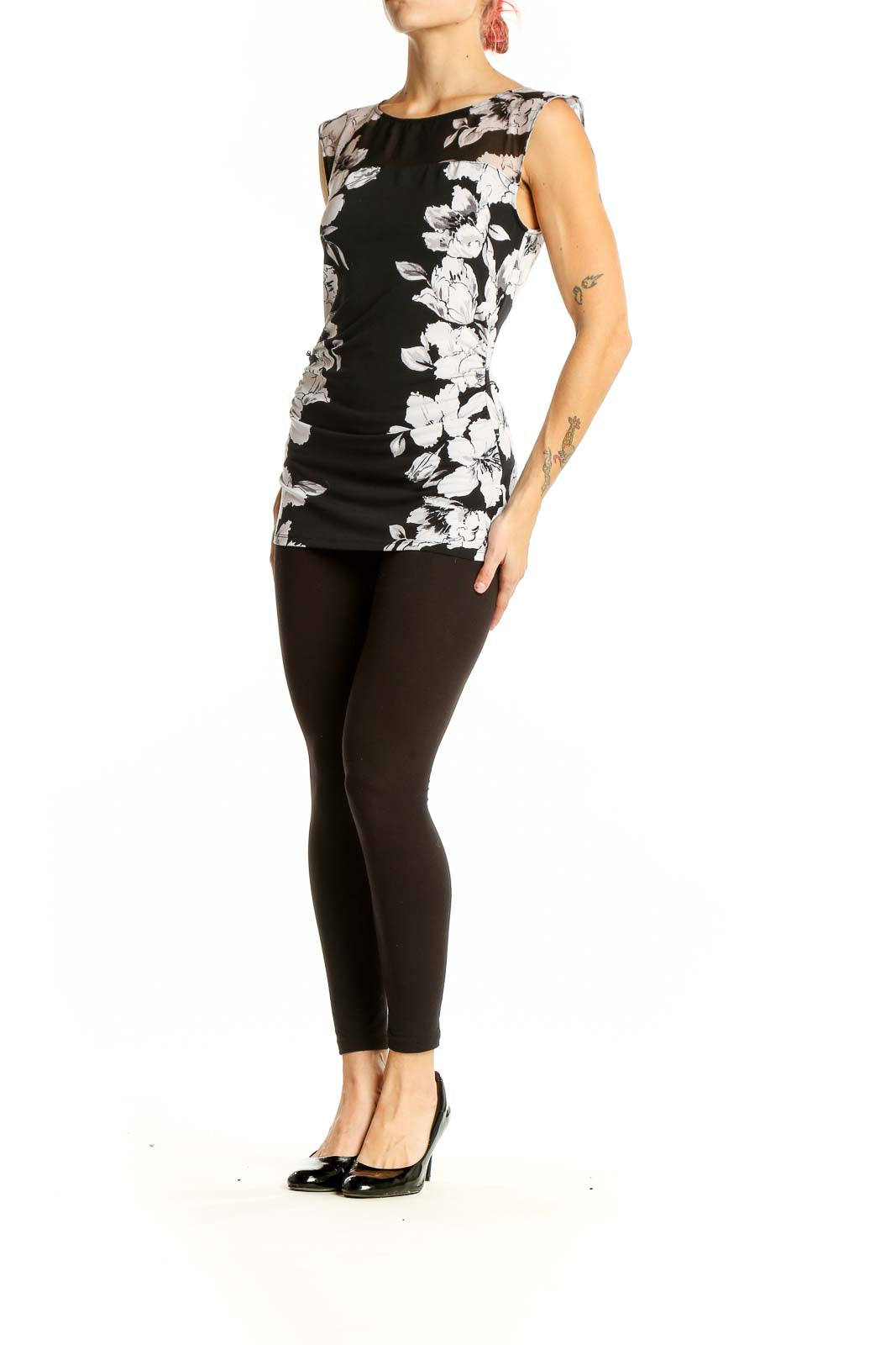 Front view of Black and White Floral Sleeveless Top from White House Black Market