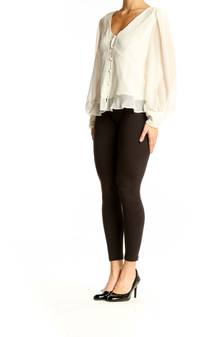 Front view of Nine West ivory sheer button-up blouse with V-neck