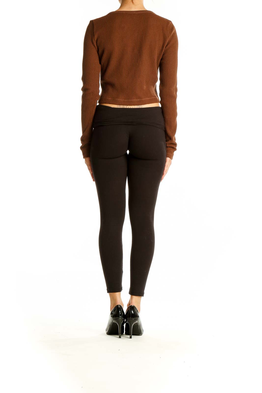 Side view of Madewell brown waffle knit crop top showing cropped length