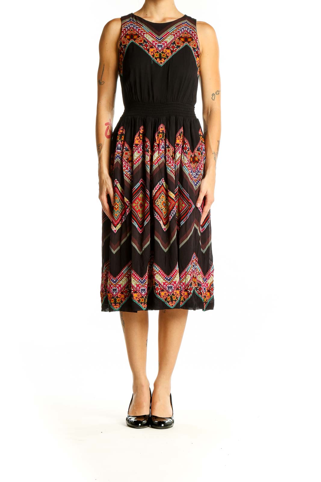 Front view of Tanvi Kedia black midi dress with colorful floral embroidery