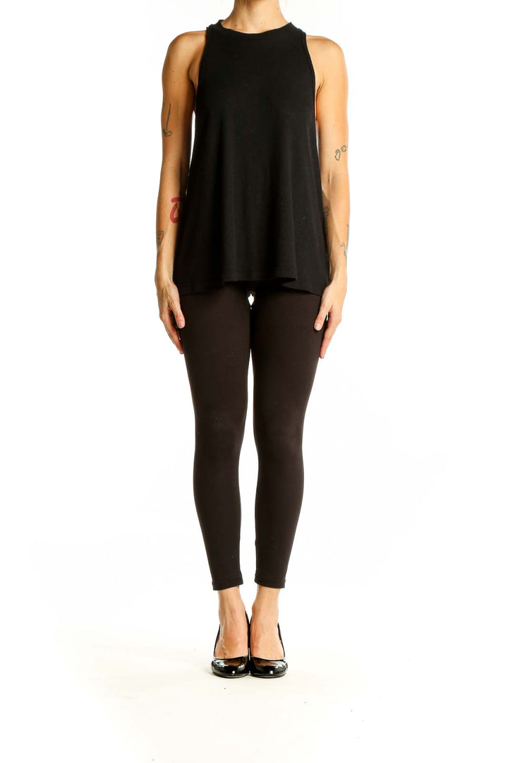 Front view of Free People black sleeveless flowy knit top