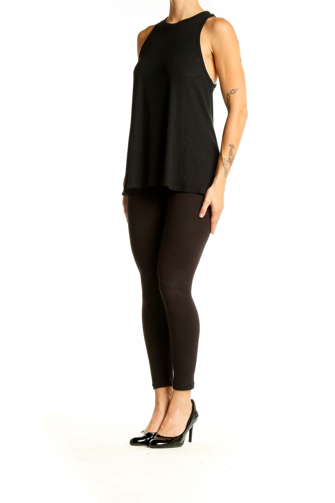 Front view of Free People black sleeveless flowy knit top