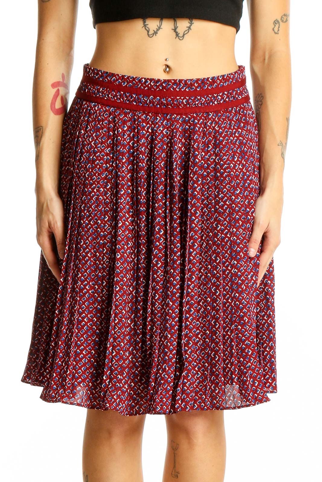 Front view of Banana Republic red patterned pleated midi skirt