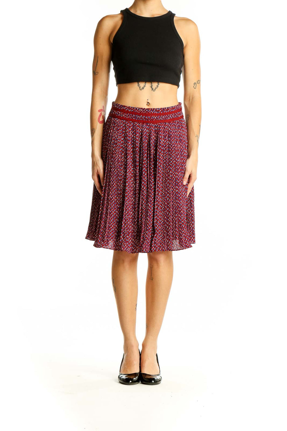 Front view of Banana Republic red patterned pleated midi skirt