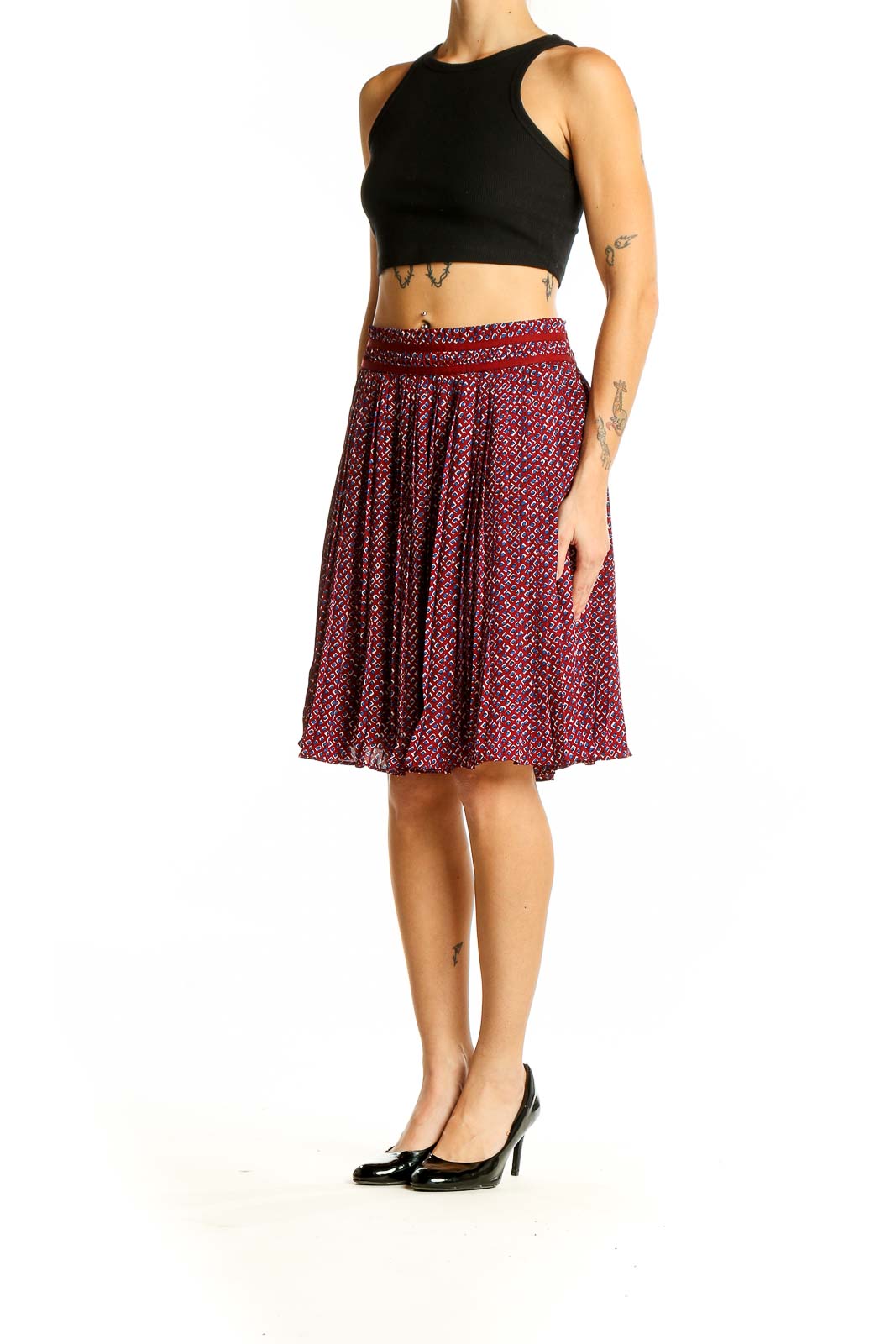 Front view of Banana Republic red patterned pleated midi skirt