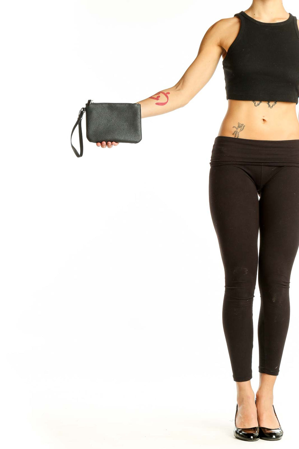 Front view of Steve Madden black leather wristlet clutch