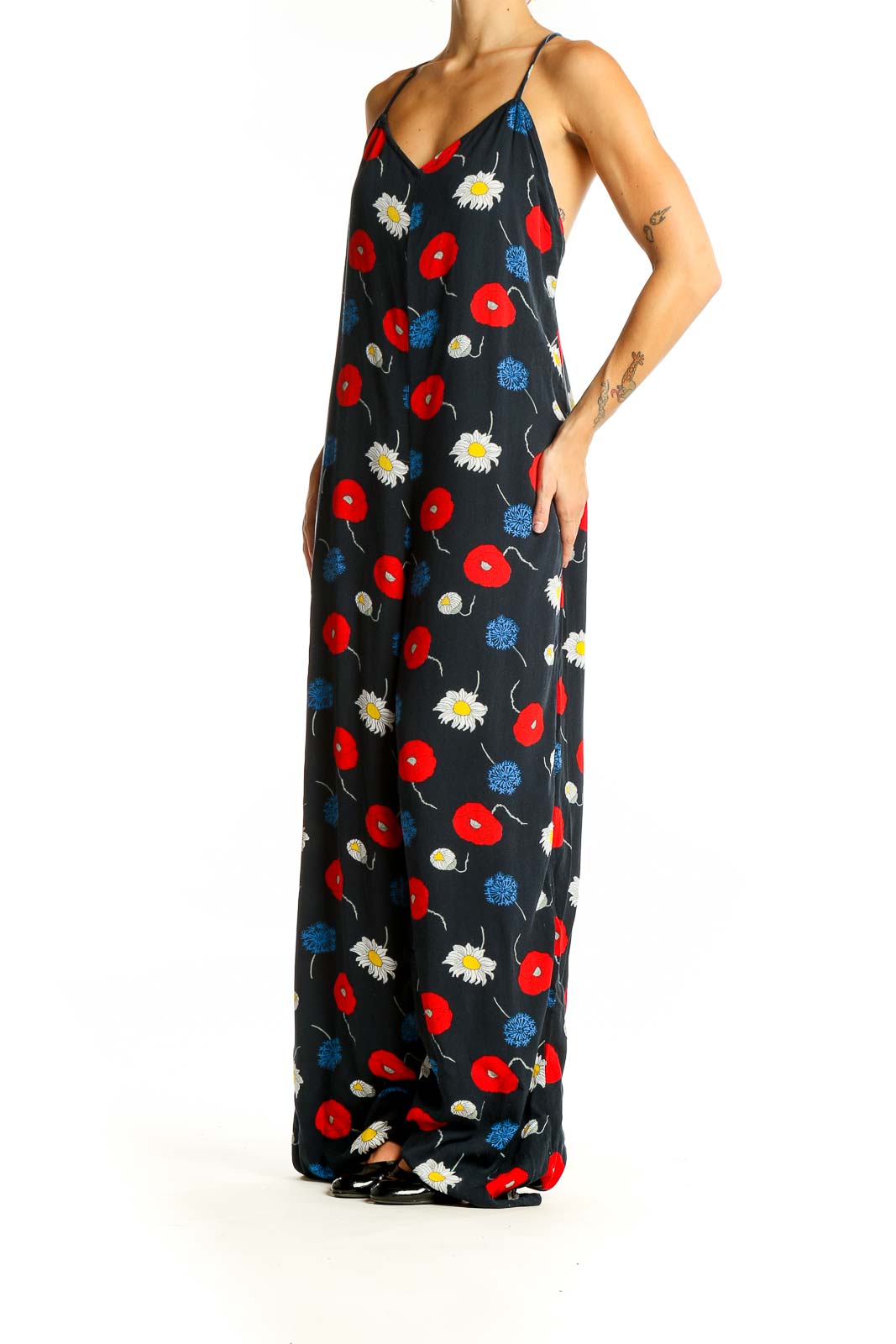 Front view of American Apparel Black Floral Print Jumpsuit with red poppies and daisies