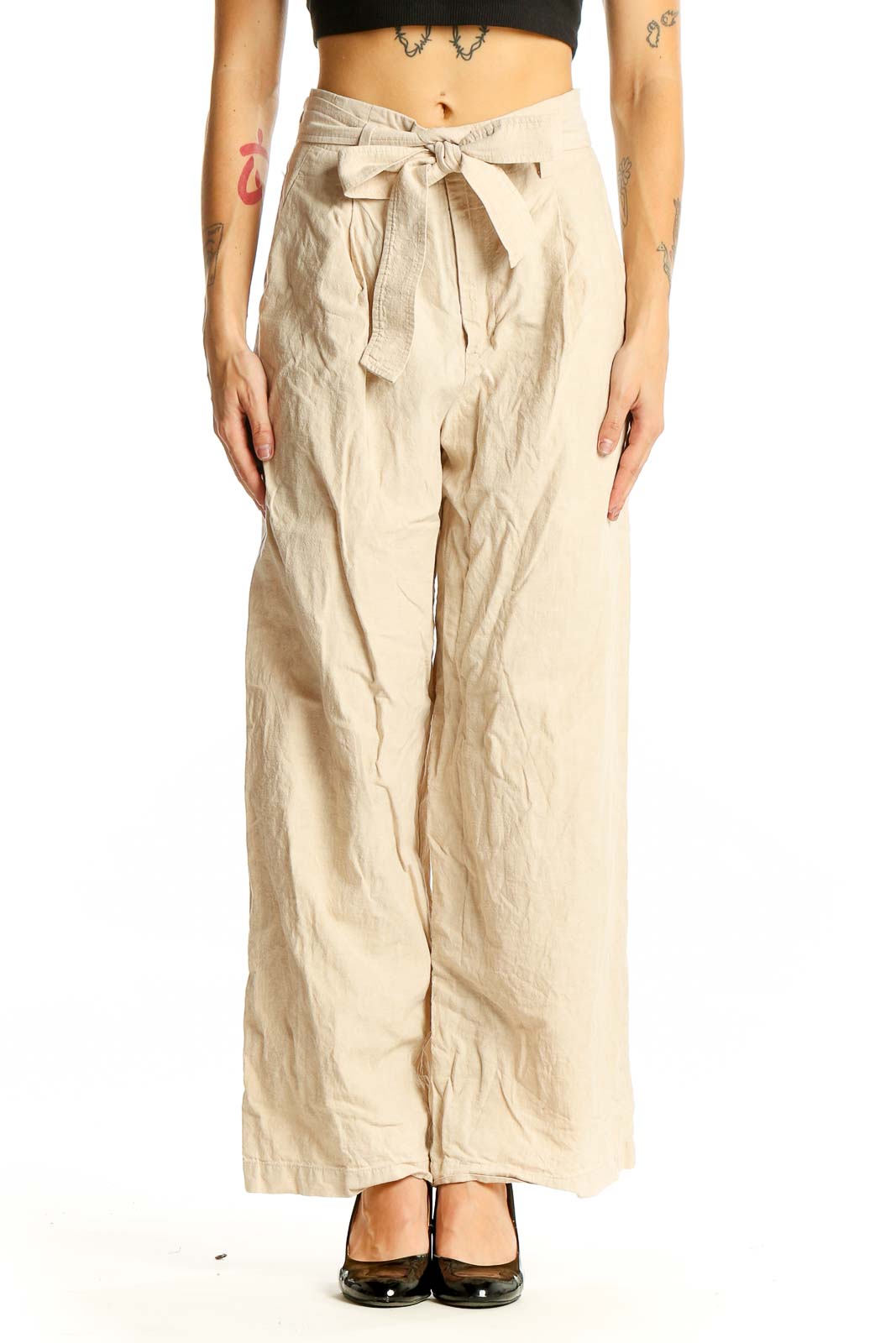 Front view of Uniqlo beige linen wide-leg pants with tie waist