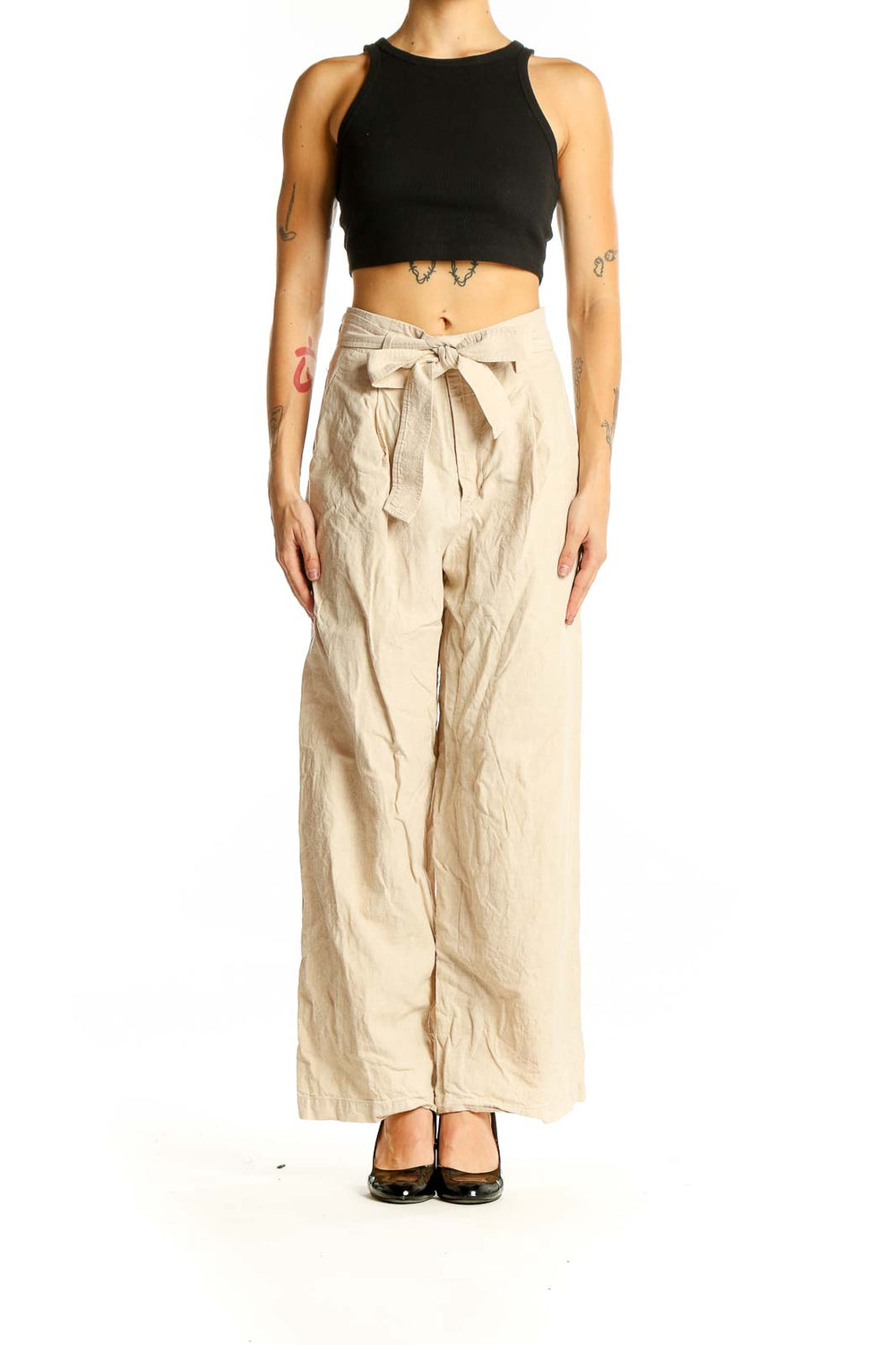 Front view of Uniqlo beige linen wide-leg pants with tie waist