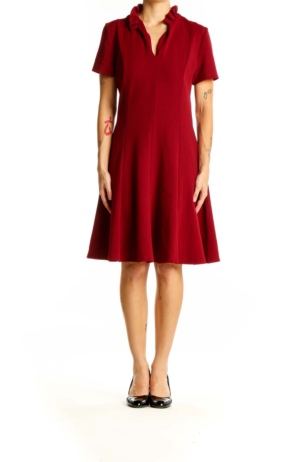 Front view of red Gilli dress with ruffled collar and A-line silhouette