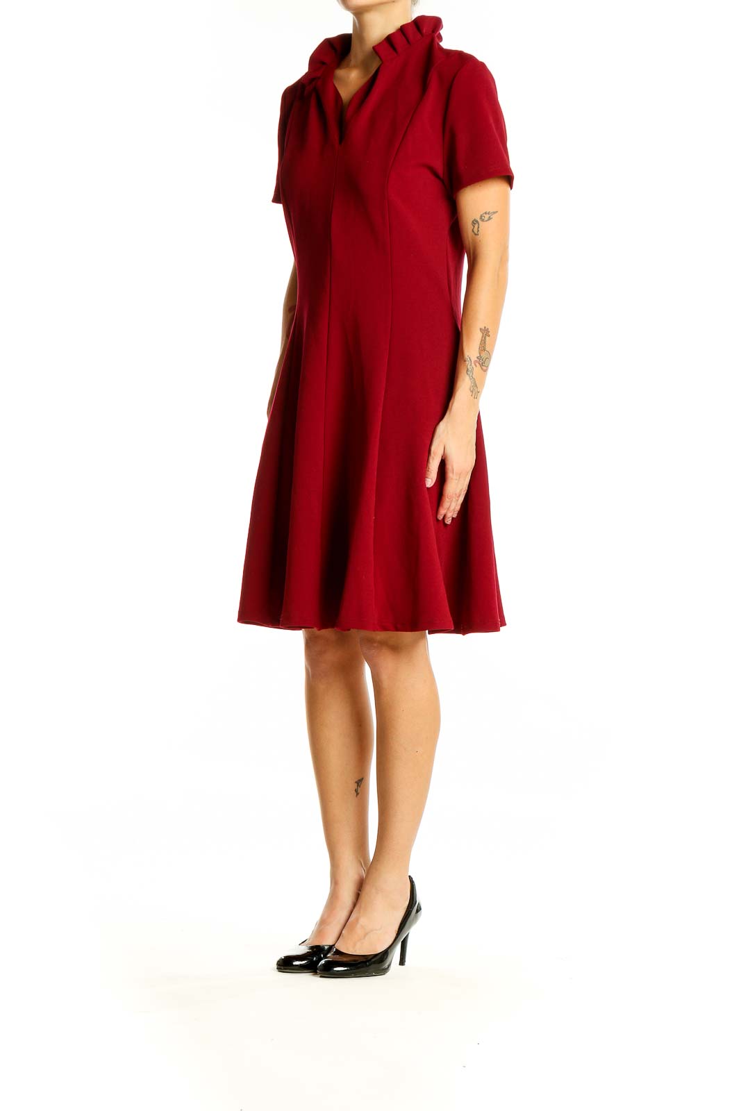 Front view of red Gilli dress with ruffled collar and A-line silhouette