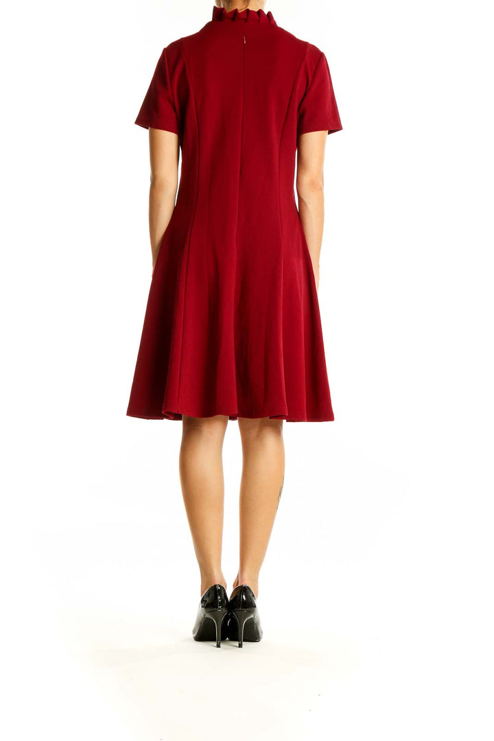 Back view of red Gilli A-line dress showing knee-length cut