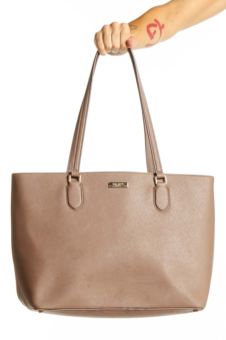 Front view of Kate Spade taupe leather tote bag