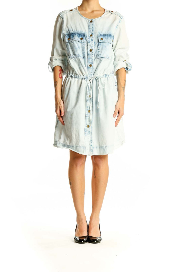 Front view of Michael Kors light blue denim shirt dress with button-up front and chest pockets