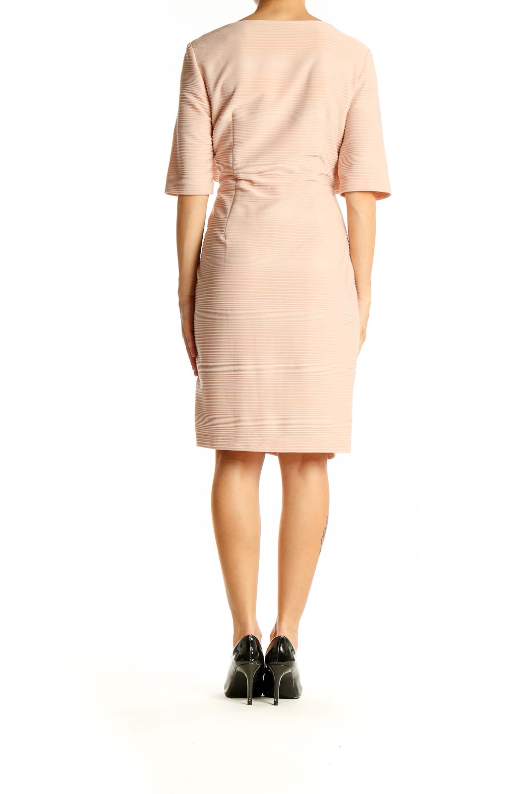 Back view of Connected Apparel blush ribbed bodycon midi dress showing fitted silhouette