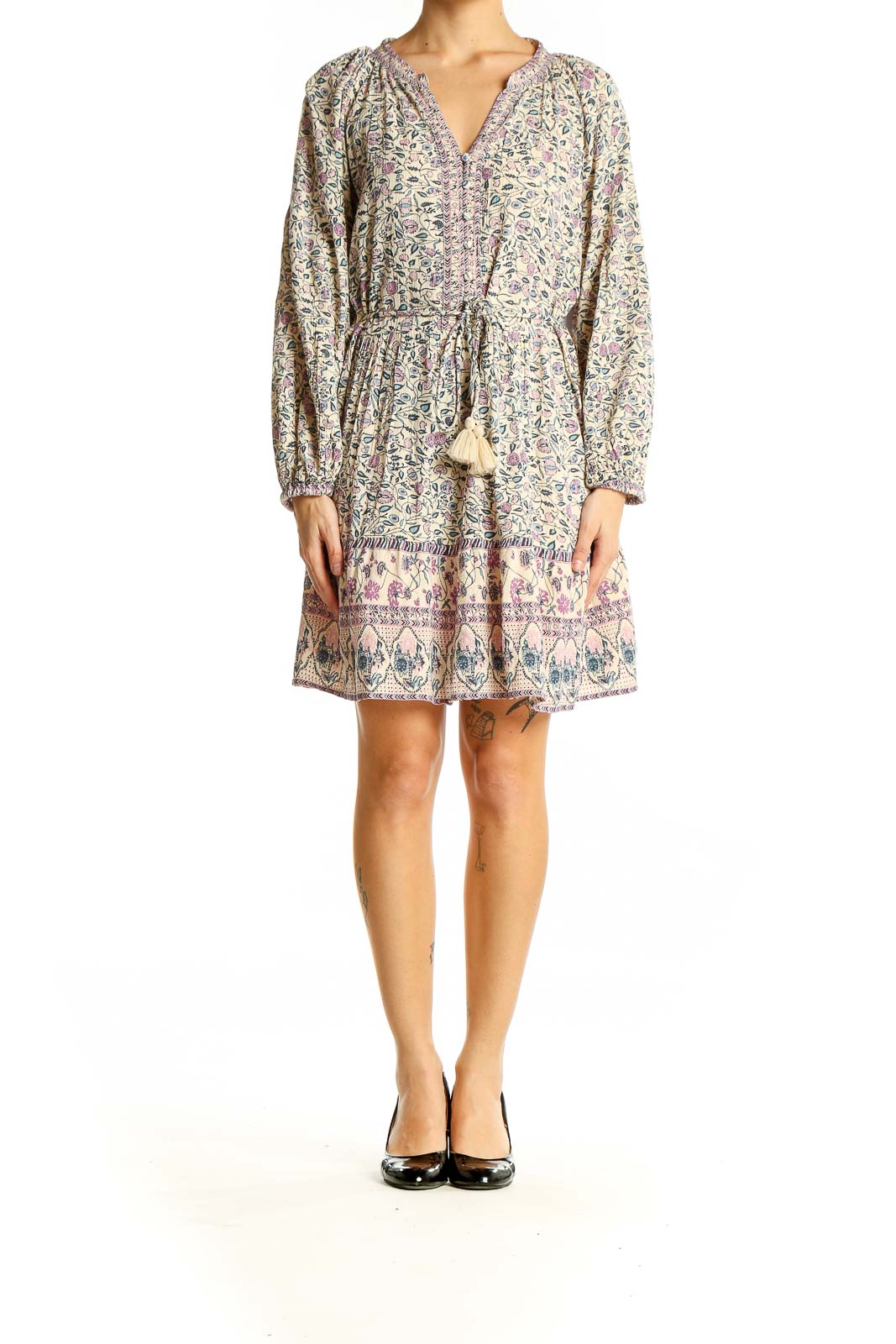 Front view of SilkRoll beige floral mini dress with V-neck and long sleeves