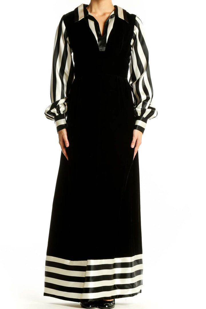 Front view of SilkRoll Black and White Striped Velvet Maxi Dress with long sleeves