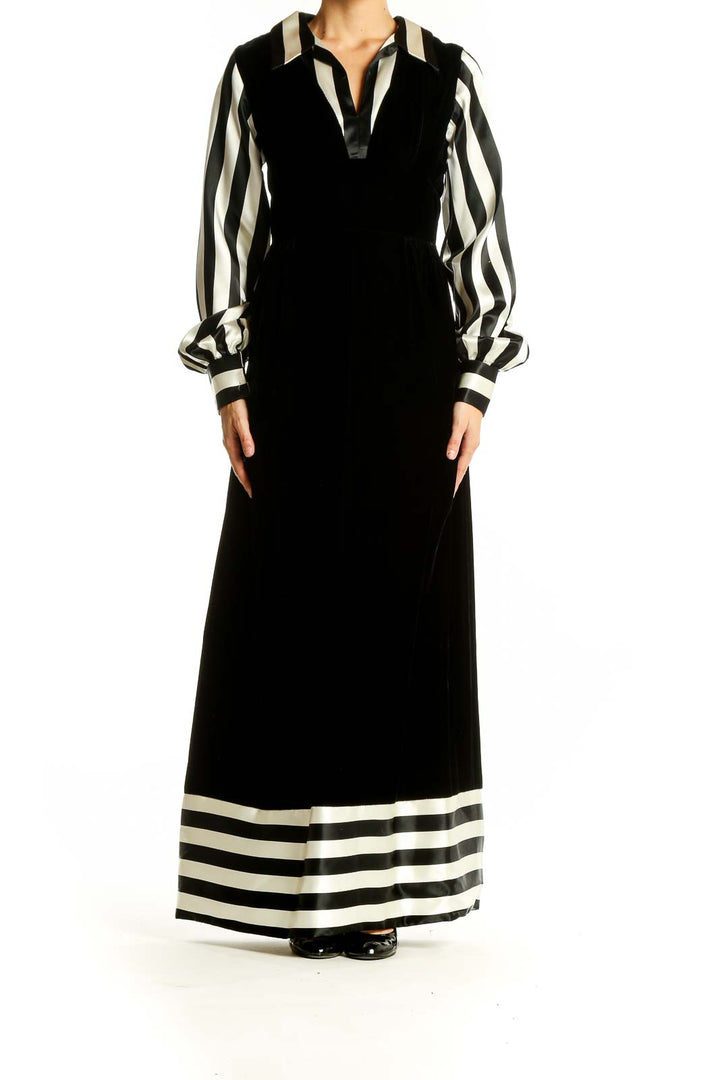 Front view of SilkRoll Black and White Striped Velvet Maxi Dress with long sleeves