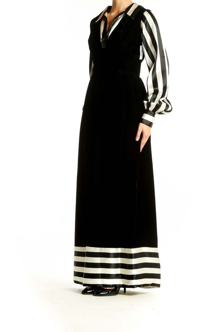 Front view of SilkRoll Black and White Striped Velvet Maxi Dress with long sleeves