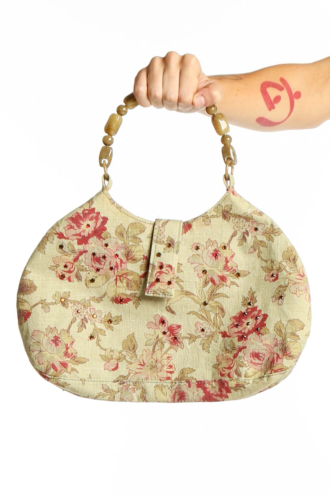 Front view of SilkRoll beige floral print clutch handbag with beaded handle